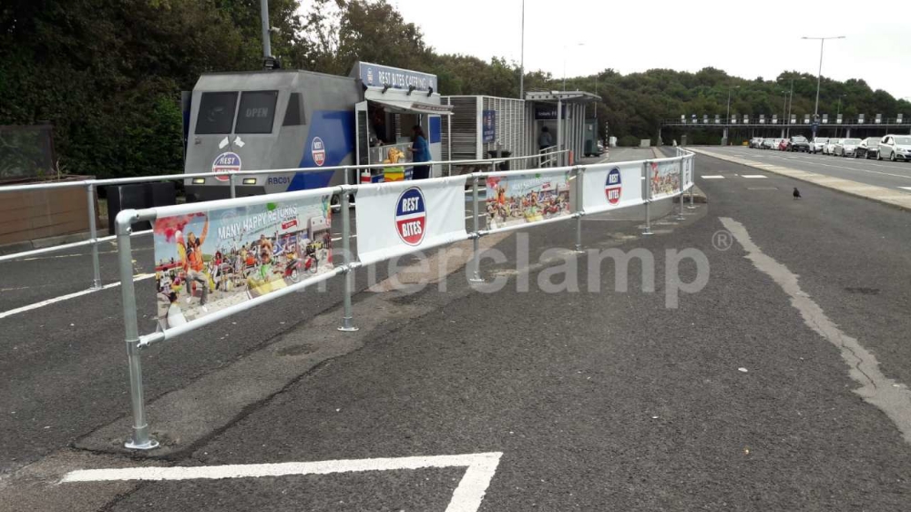 Interclamp key clamp fittings used to create safety barriers and handrails at the Eurotunnel, protecting pedestrians near the busy catering sections.